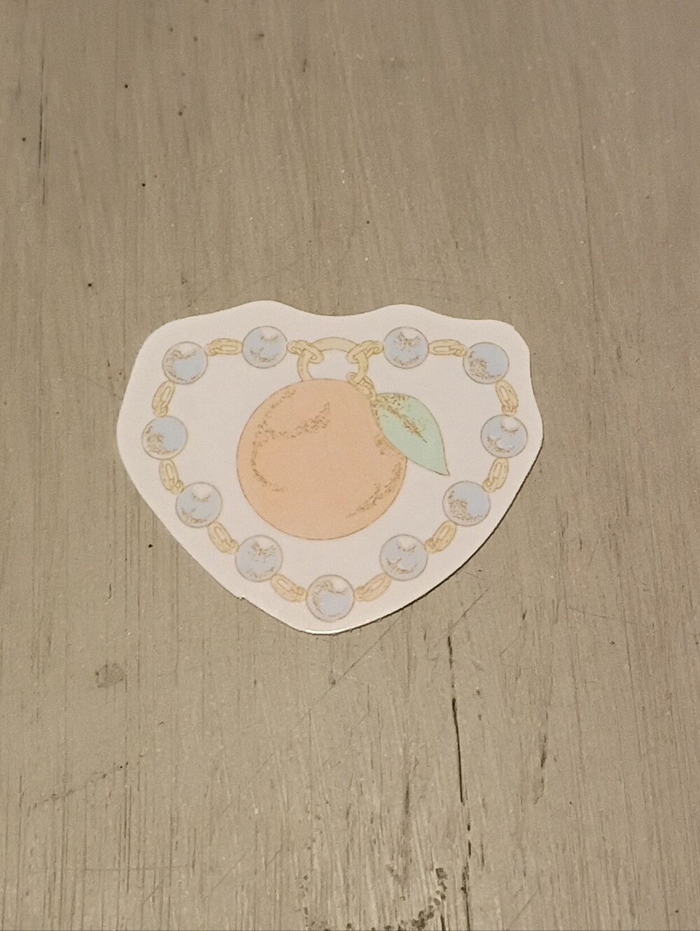 10/$10 Sticker Decal - Blue Beaded Necklace With Orange Fruit & Leaf Charm